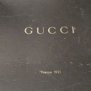 Authentic Gucci boots with built in leg warmers.